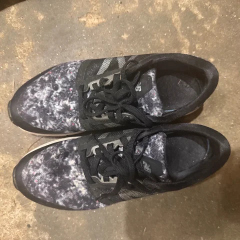 Worn Black New Balance Sneakers - Digital Photos