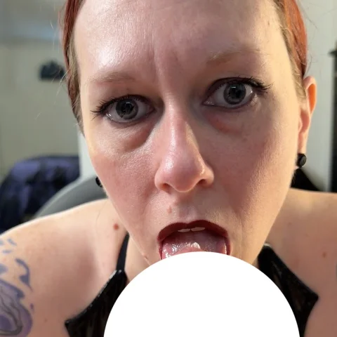 Goth redhead with cum all over her face photo set