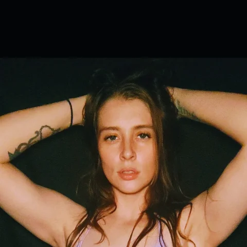Purple bathing suit tease photos