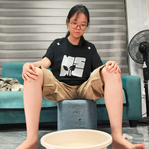 Xin Xin Washes Her Feet