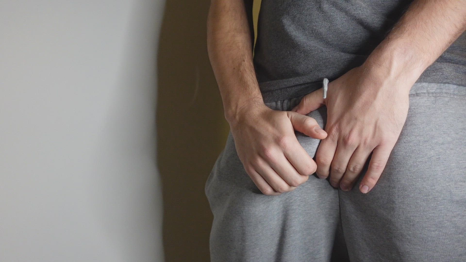 Grey sweatpants and ball closeups