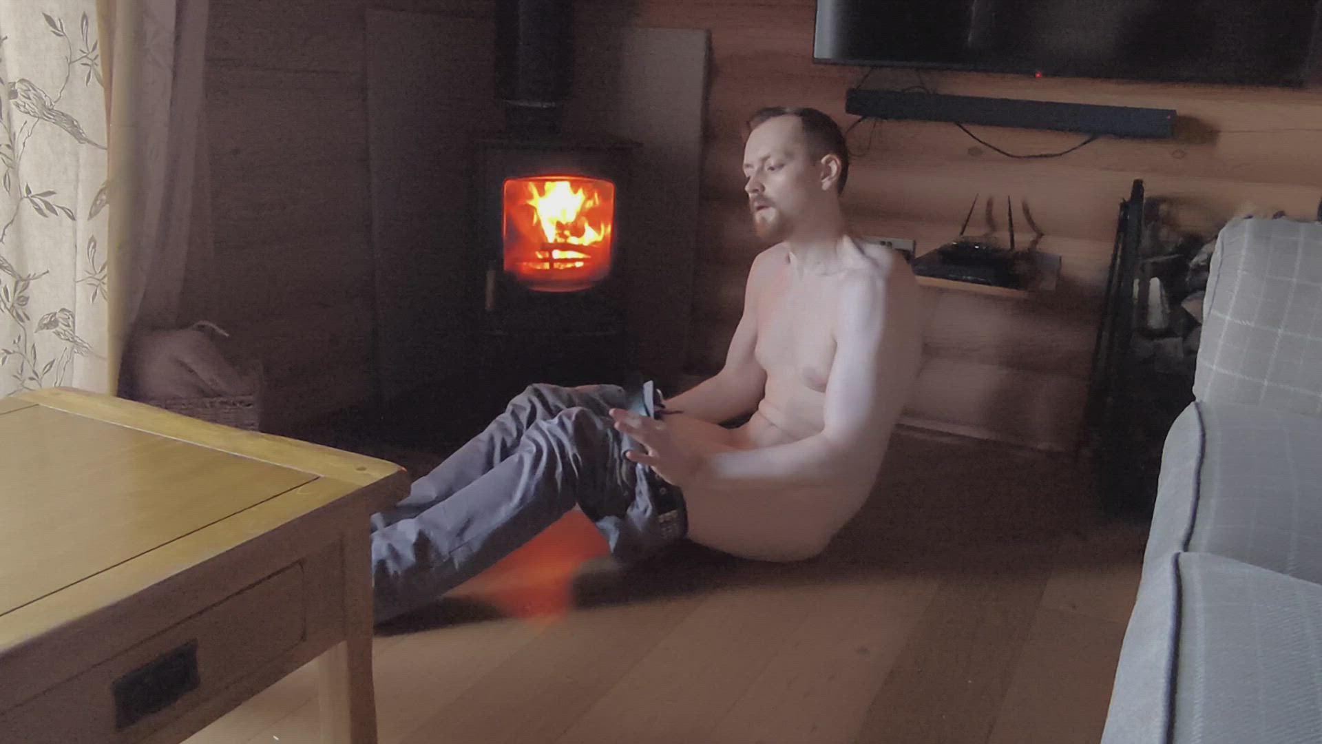 Stripping In Front Of The Fire