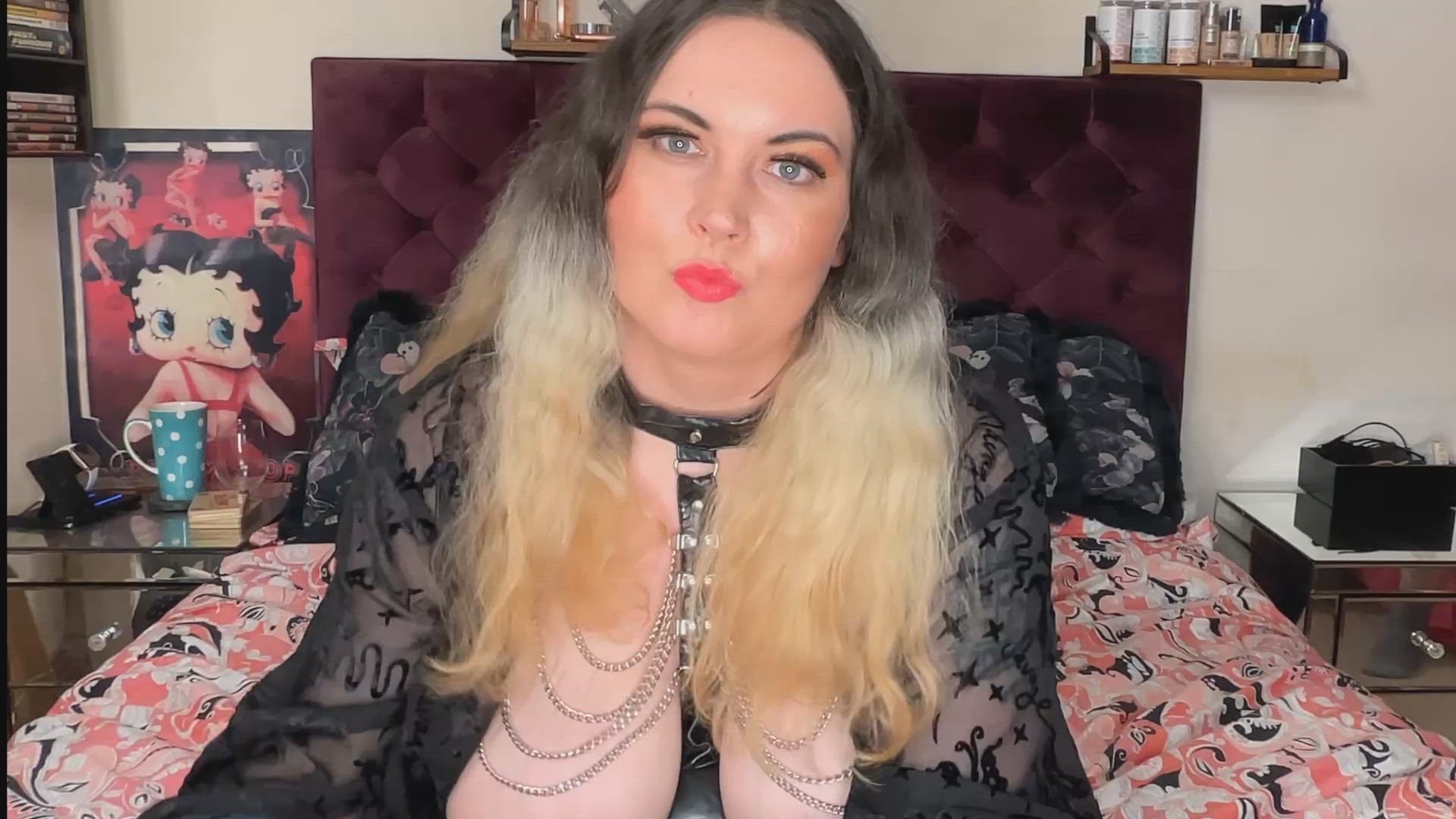 Whore tries on her new heels while wearing a PVC outfit