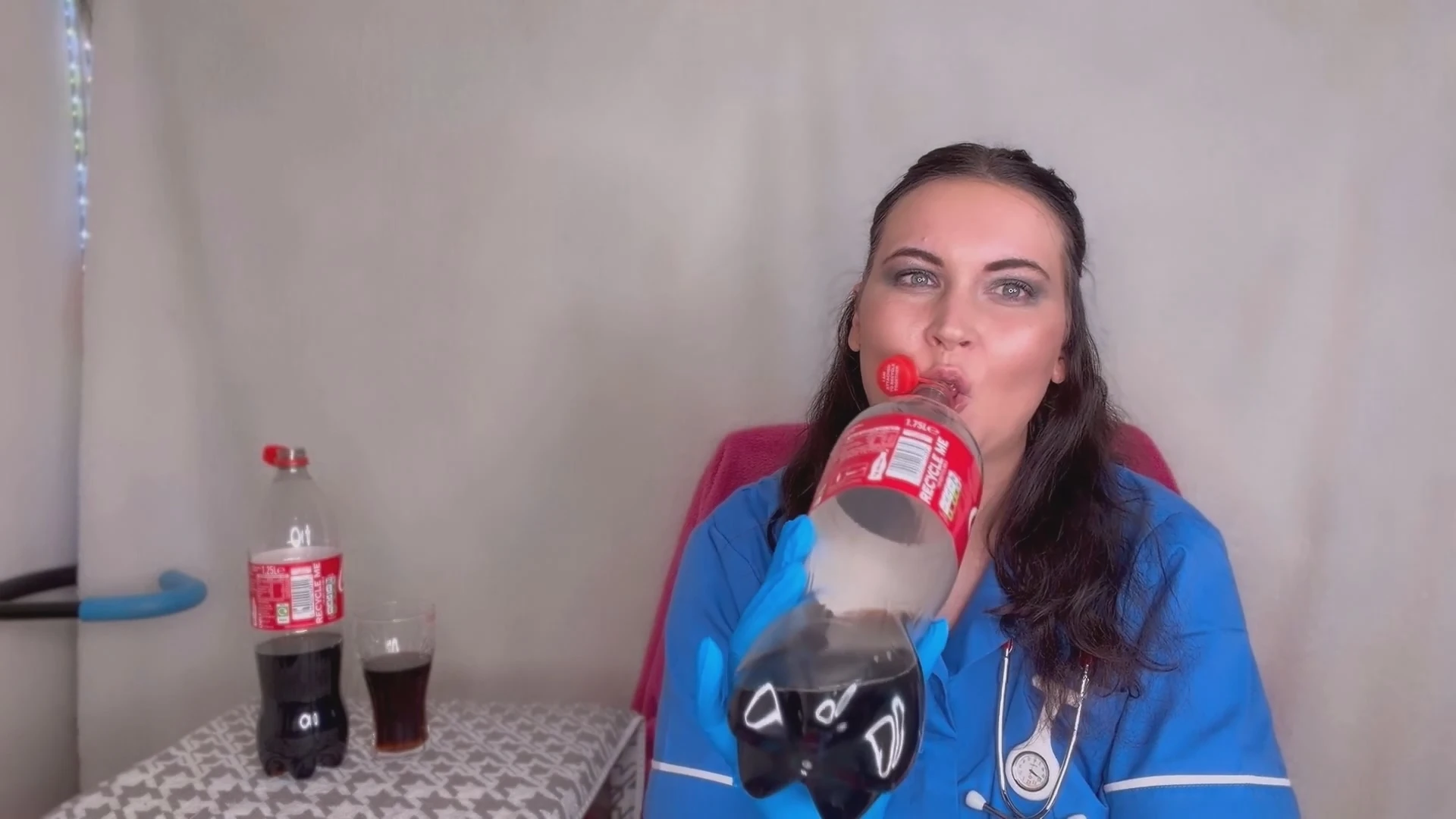 Nurse FFW having fizzy cola and burping