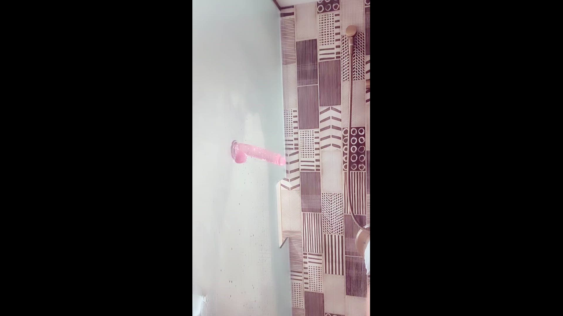 Giving my toy a bj in the shower